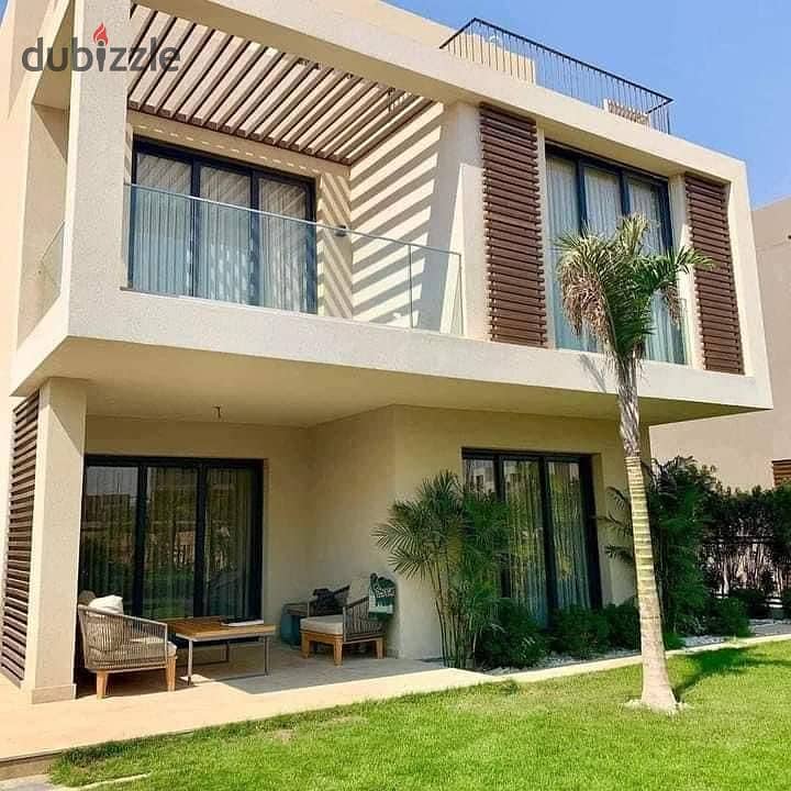 Immediately receive a standalone villa, prime location, for sale in Palm Hills New Cairo Compound, directly on the ring road, Palm Hills New Cairo. 0