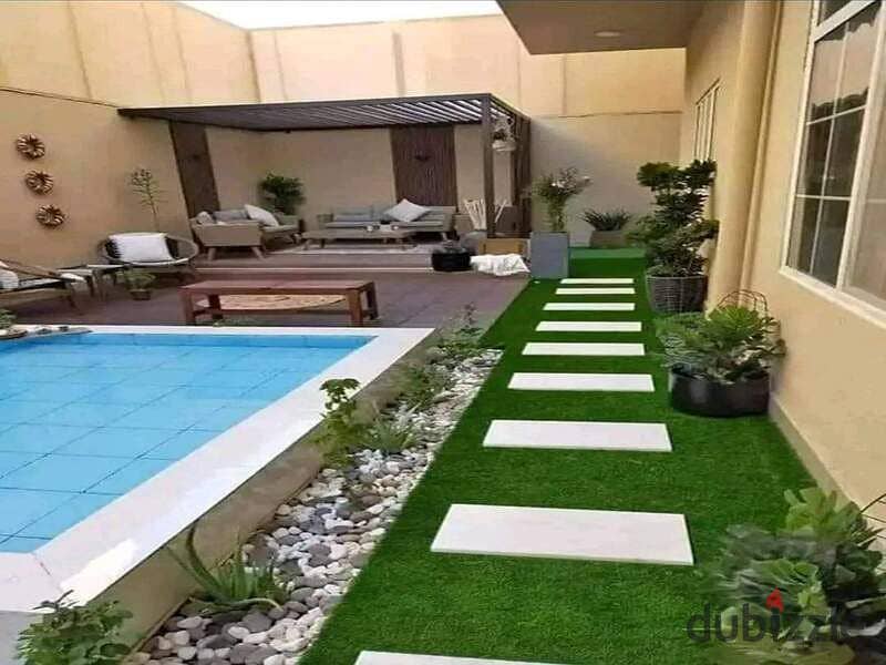 At the first offering price from Madinet Misr Company MNHD, own a prime location townhouse for sale in a fully serviced compound, wall by wall, with M 4