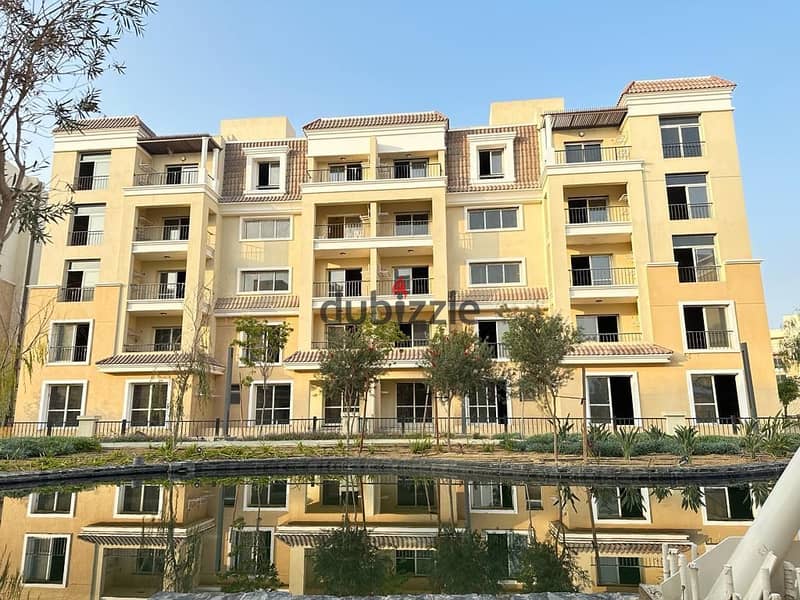 For sale, 130 sqm apartment with private garden, with 831 thousand down payment, in Sarai Compound in New Cairo. 1