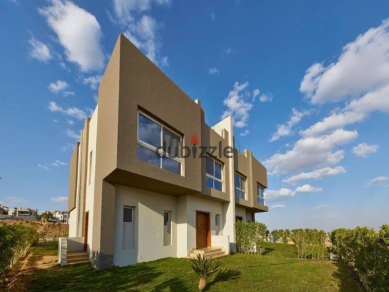 In Sheikh Zayed, receive immediately a villa for sale in installments next to Al Rabwa in Etapa Compound 1