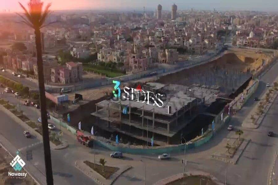 Direct to Suez for sale, a 98 m2 shop, finished with AC'S + convenient installments + delivery soon in the first mega mall 3 Sides Mall 0