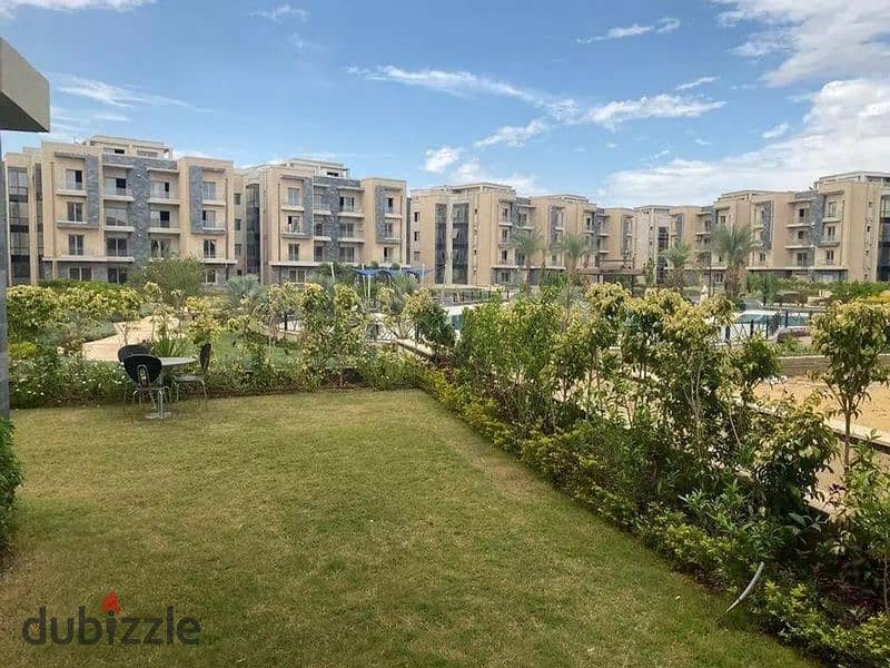 The best location next to Mivida for sale, an apartment with Garden delivery now in Galleria Moon Valley, Fifth Settlement 7