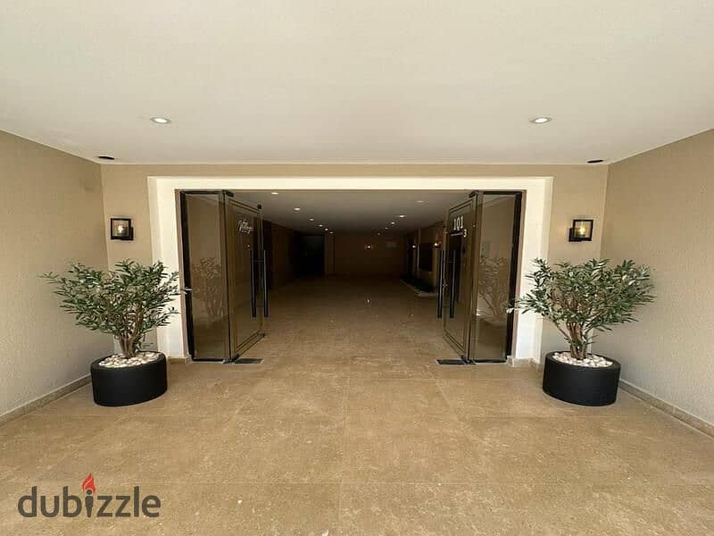 For sale, a 231 m penthouse, fully finished with AC's, with convenient installments, in the heart of Sheikh Zayed, in Village West Compoun 4