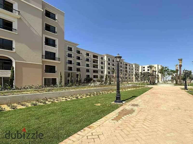 For sale, a fully finished apartment with AC's, ready for immediate delivery, with convenient installments, in the heart of Sheikh Zayed, 1