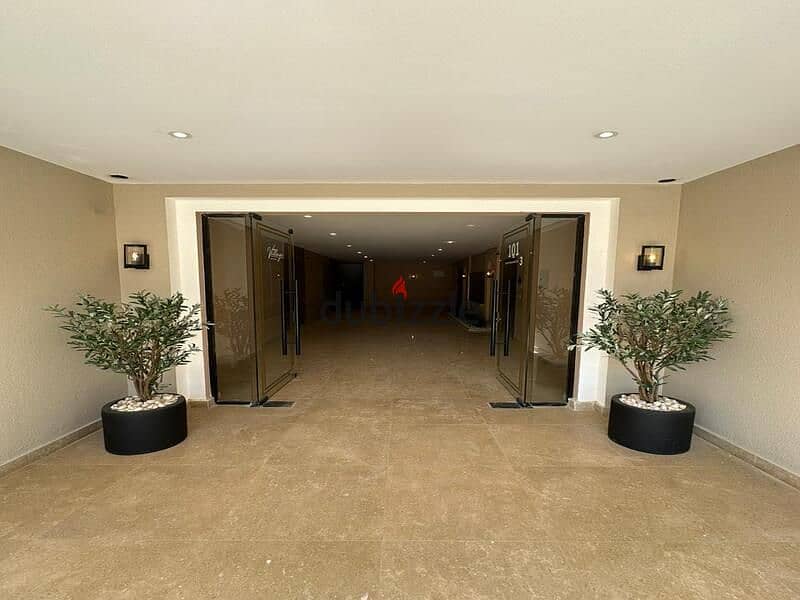 For sale, a fully finished apartment with AC's, ready for immediate delivery, with convenient installments, in the heart of Sheikh Zayed, 8