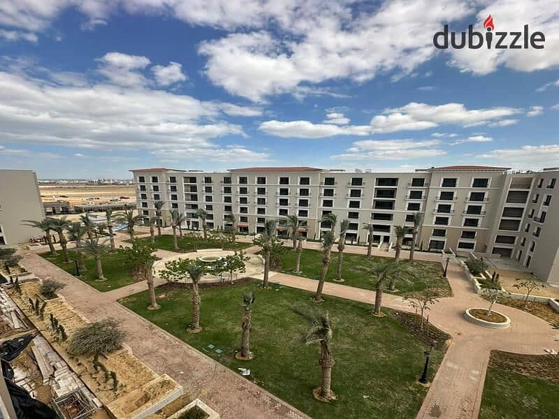 For sale, a fully finished apartment with AC's, ready for immediate delivery, with convenient installments, in the heart of Sheikh Zayed, 9