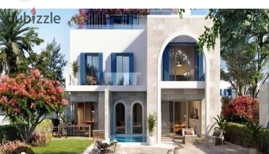 Villa for sale with lagoon view in Sheikh Zayed, with installments over 9 years, in front of Beverly Hills