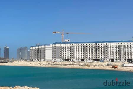 Receive a two-bedroom apartment in the Latin Quarter and today's summer on the clearest sea in New Alamein - North Coast