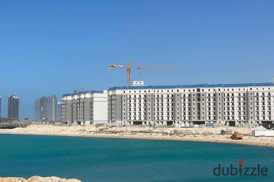 Receive a two-bedroom apartment in the Latin Quarter and today's summer on the clearest sea in New Alamein - North Coast 0