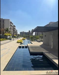 Apartment 160. M with garden 110. M in The Address East New Cairo fully finished for sale with kitchen and dressing ready to move with down payment 0