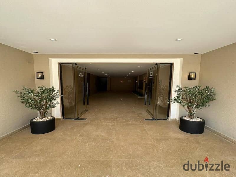 For sale, a finished penthouse with AC's, delivery soon, in comfortable installments, in the heart of Sheikh Zayed, in the Village West Co 9