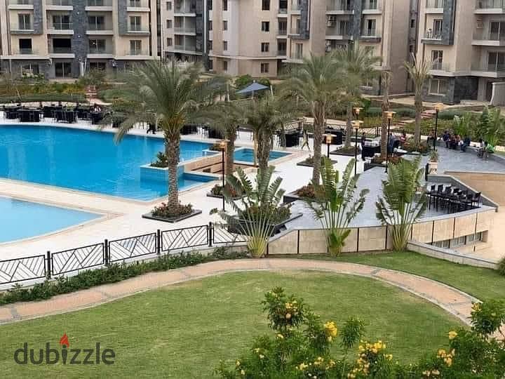 In Palm Hills New Cairo, a ground floor apartment with a garden, fully finished, Ultra Super Luxe, direct on the lagoon, for sale in Cleo Phase, Palm 0