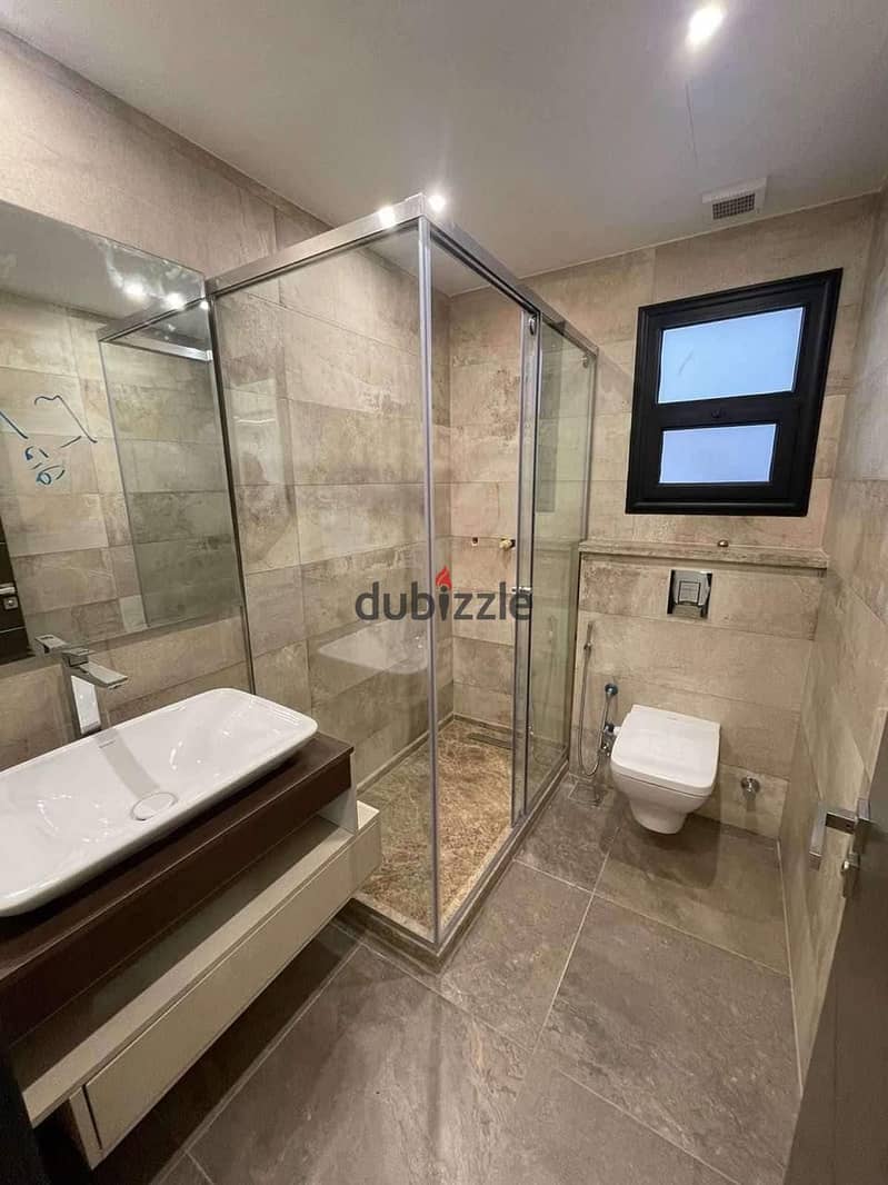 Apartment 175. M in Midtown fifth settlement in front of AUC Ultra Super Lux finishing for sale with AC'S and kitchen cabinets at a special price 7