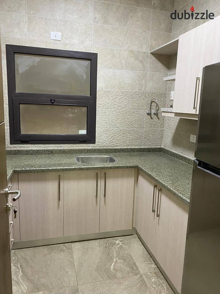 Apartment 146. M with garden 80. M in Fifth Square Al Marasem fully finished for sale with AC'S and Kitchen under market price 5