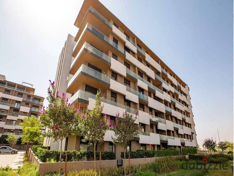 Apartment for sale in the best location in Al Burouj Compound, installments over 7 years 1