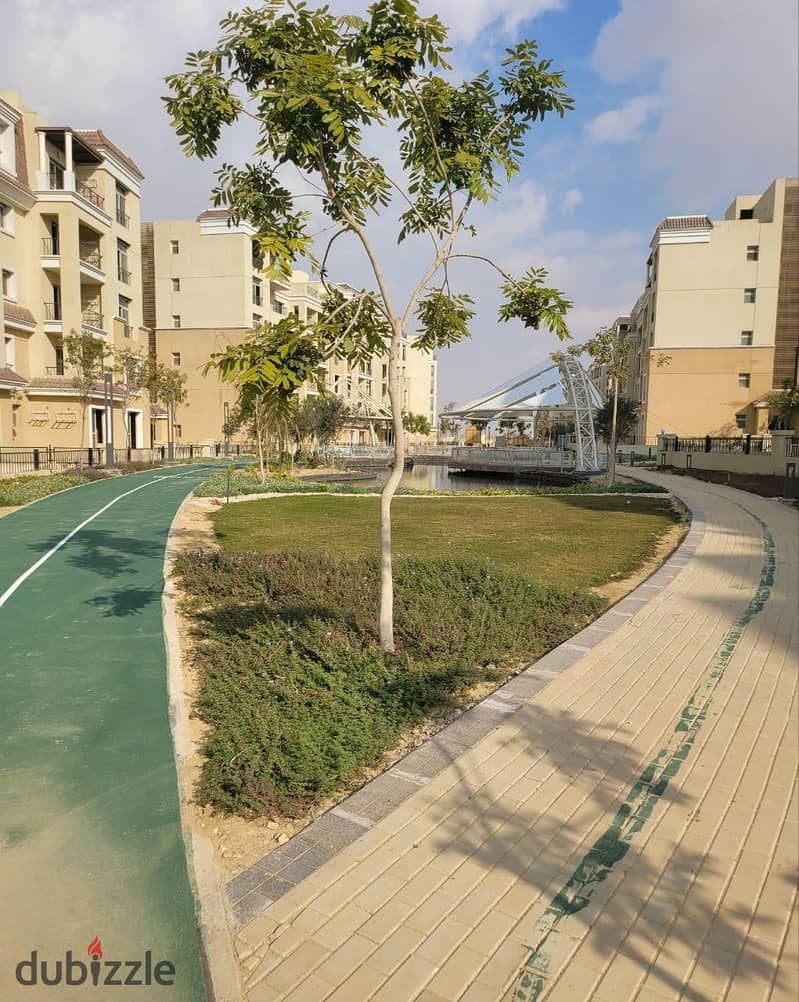 With 916,000 down payments in front of the airport, own a 3-bedroom apartment in a garden + comfortable installments in Sarai, New Cairo. 4