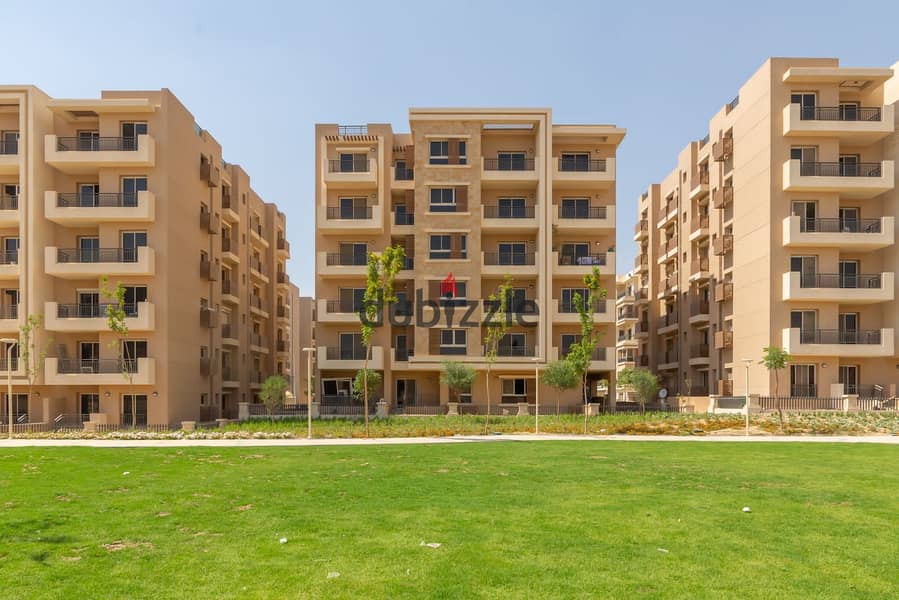 For sale, a 3-bedroom apartment in comfortable installments, minutes away from Nasr City, Taj City, New Cairo. 3