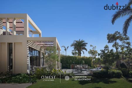 Own a villa in O West with a 400 sqm area and a 7-year installment plan, in a prime location directly on Wahat Road.