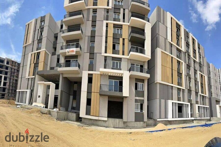 Apartment with garden for sale in Hassan Allam Hap Town Compound Mostaqbal 7