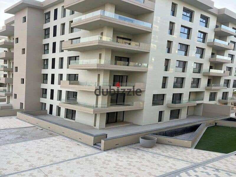 Apartment for sale in Alborouj Compound on Misr Ismailia Road in front of the International Medical Center 0