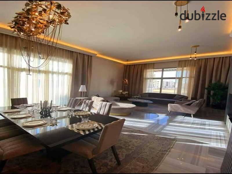 Fully finished apartment with air conditioners and kitchen on the southern 90th floor of Hassan Allam 5