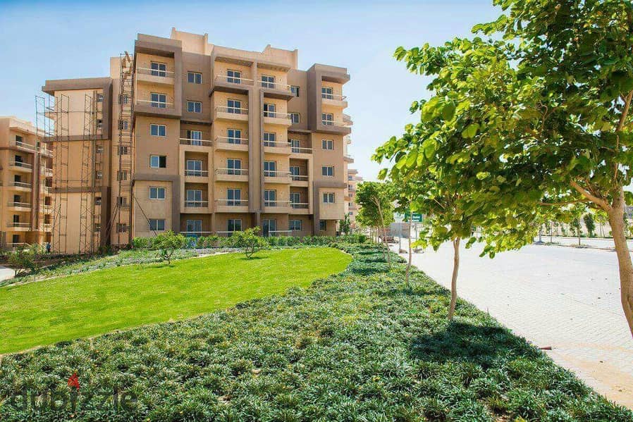 Apartment for sale in October Gardens in interest-free installments in Ashgar City Compound with a distinctive view of the landscape 2