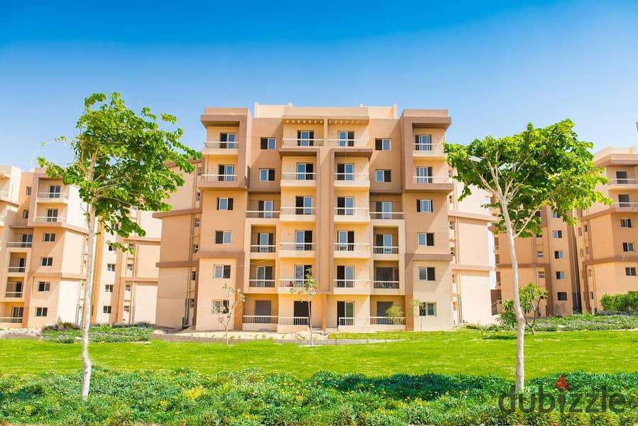 Apartment for sale in October Gardens in interest-free installments in Ashgar City Compound with a distinctive view of the landscape 9