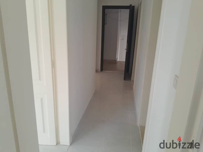 Apartment for sale in Madinaty, Model 100, area 107 square meters, first residence, garden view 4