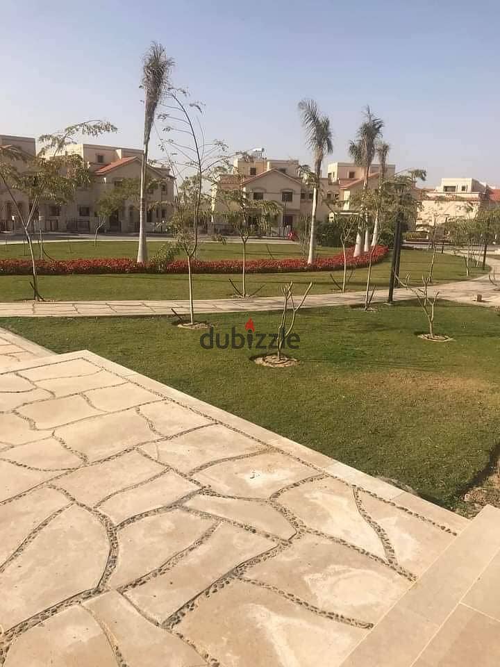 Independent villa for sale, sea view, with a large garden, in installments, next to the hotel area in Madinaty 6