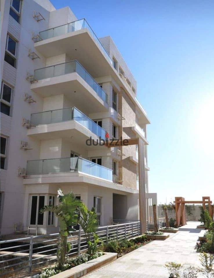 Apartment for sale, ground floor, with garden, in Mountain View iCity, October behind Mall of Arabia 3