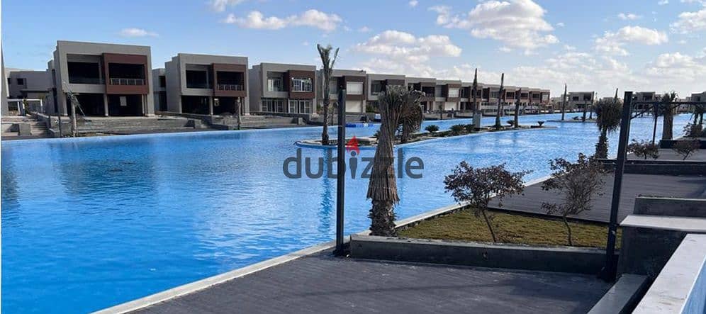 fully finished chalet on lagoon 110m with installments over 10 years in Hacienda Waters North Coast Ras El Hekma شاليه ع اللاجون متشطب 110م بتسهيلات ع 2