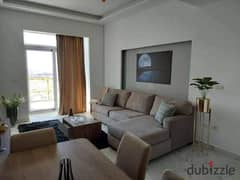 A finished 4-room apartment for sale in Sheikh Zayed, Swan Lake Compound, in installments