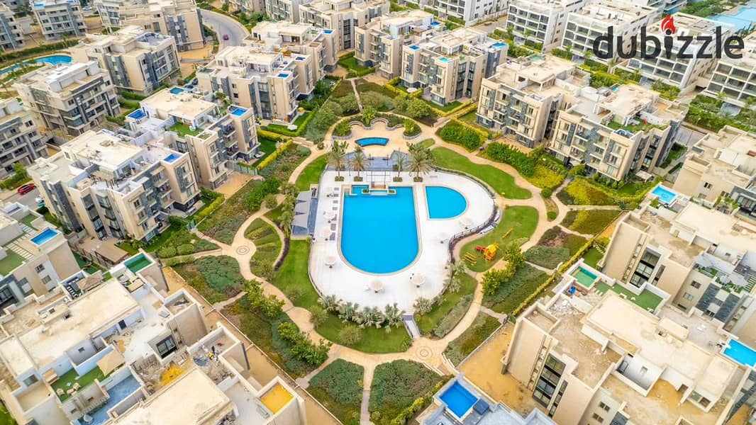 Apartment for sale in installments ready to move in Gallaria Compound, Fifth Settlement, on the main 90th Street, next to AUC 2