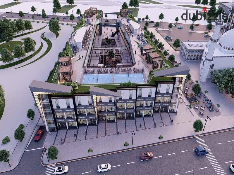 Commercial shop in October with a down payment of only 5% for sale in the first district next to Al-Hosary Mosque 7