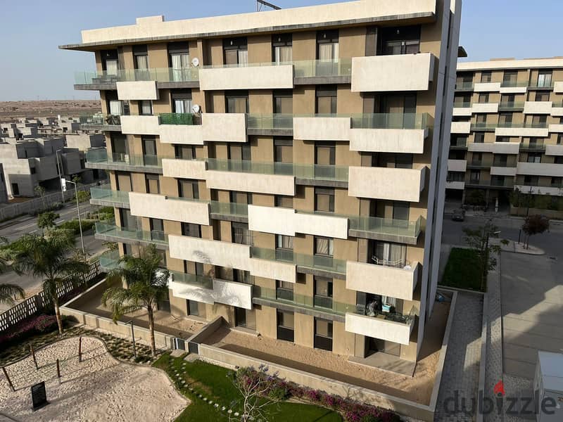 Apartment for sale in Al Burouj Compound, ground floor with garden, with an 8-year payment plan,155m 1