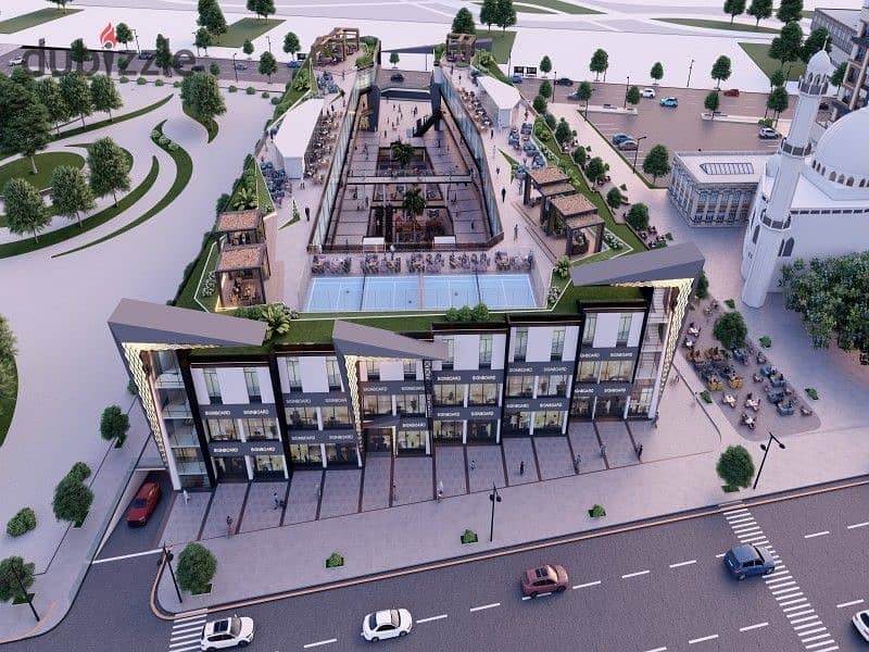 The cheapest price for a shop in October with a down payment of only 200 thousand for sale in the first district near Al-Hosary Mosque, 33 square mete 4