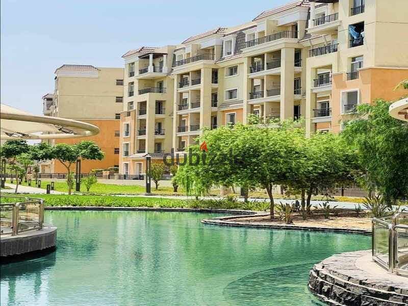 Apartment with garden for sale at the lowest price next to Madinaty in Saray Compound 8