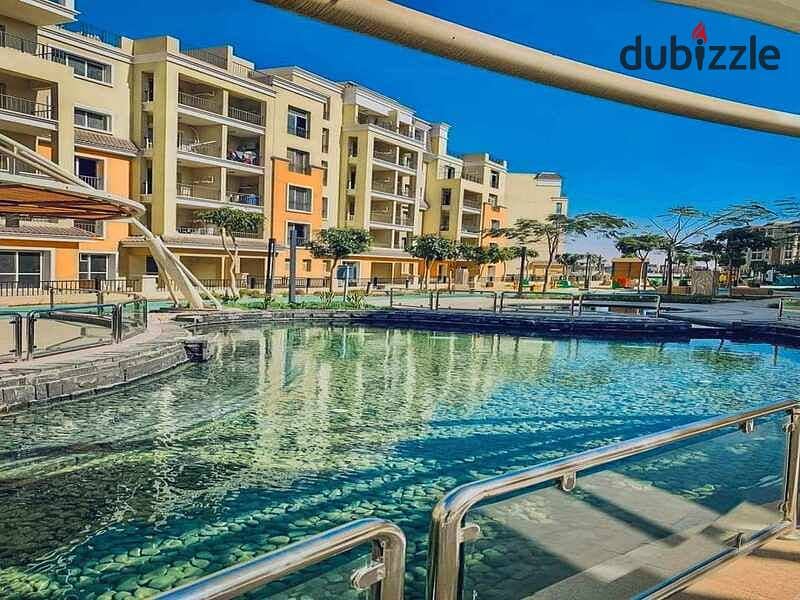 Apartment with garden for sale at the lowest price next to Madinaty in Saray Compound 9