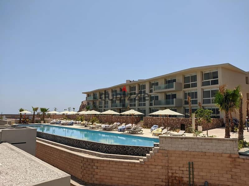 350,000 down payment for a furnished studio for sale in a hotel in Ain Sokhna 2