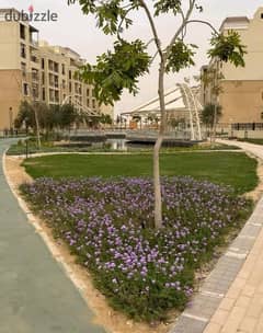 For sale, a 3-room apartment with a garden, 179 m, in Sarai Al Mostakbal City, next to Madinaty, with a down payment of 856K 0