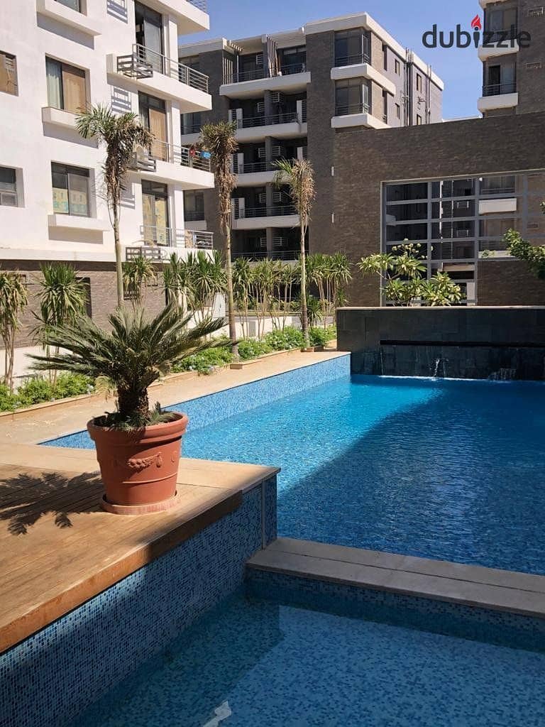 Minutes from Nasr City, an apartment for sale (2 rooms + 3 bathrooms), minimum down payment 4