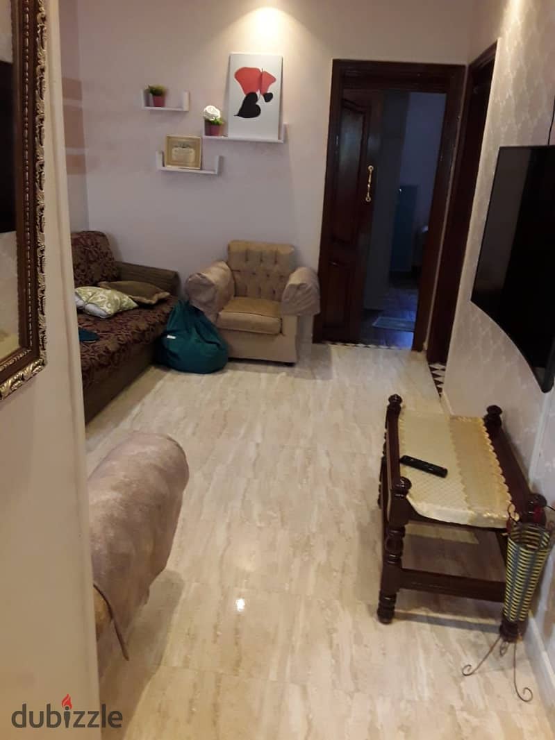 Ground floor apartment in a garden for rent in the Second District, near Fatima Al Sharbatly Mosque and the 90th   Eastern sea   Super deluxe finishin 2