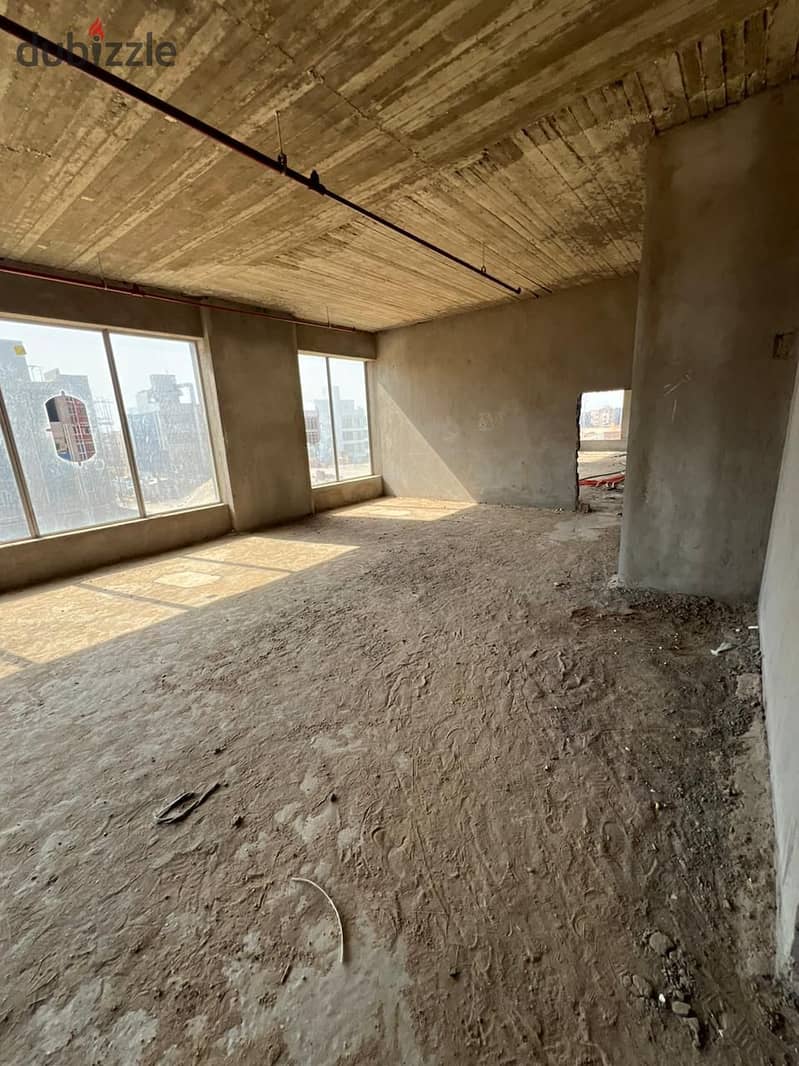 Commercial store for sale in Banafsaj Settlement, near Water Way and Mohamed Naguib Axis  Prime Location  Suitable for all activities, with an area 1