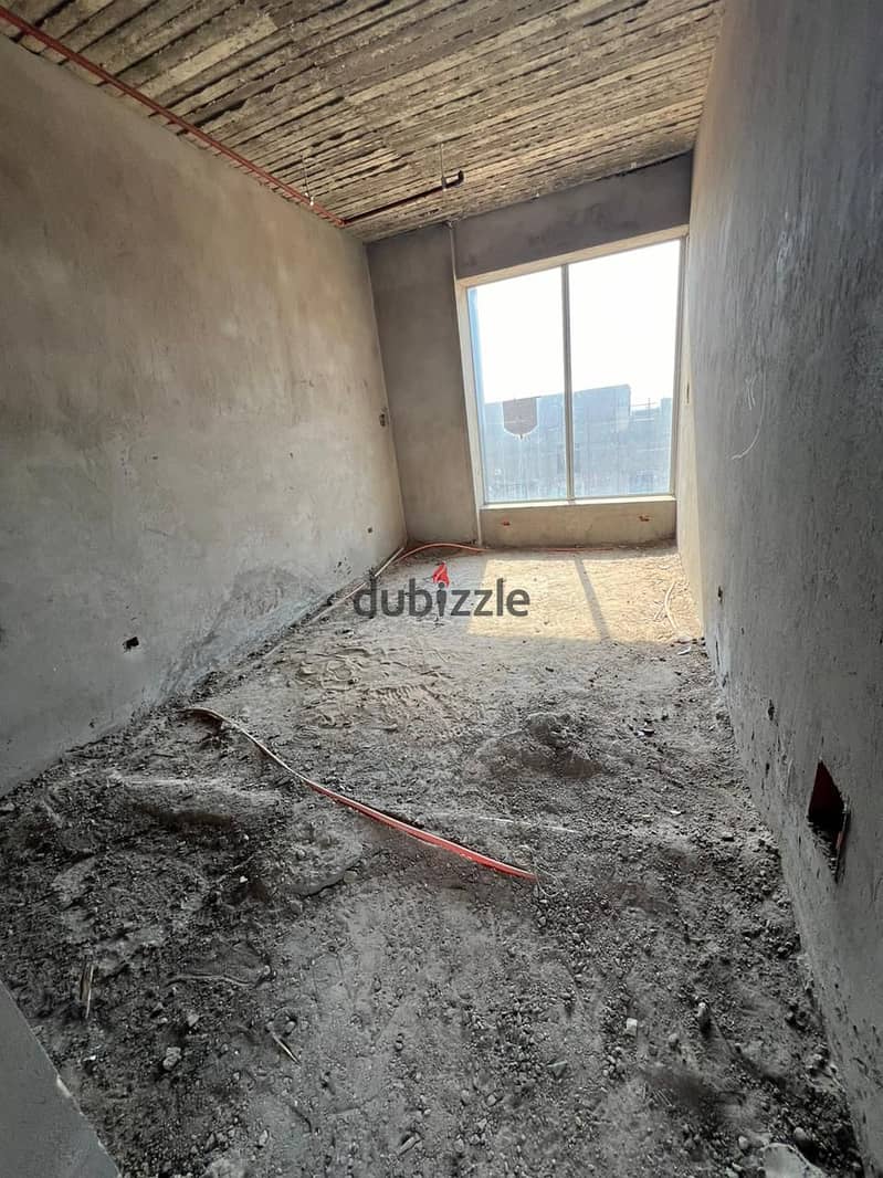 Commercial store for sale in Banafsaj Settlement, near Water Way and Mohamed Naguib Axis  Prime Location  Suitable for all activities, with an area 12