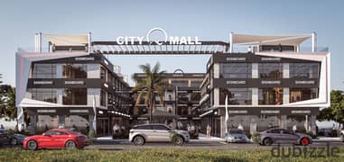 Shop for sale in October Gardens, Al-Khadamy Street, in the middle of the largest population density, area 43 square meters, down payment 301 thousand