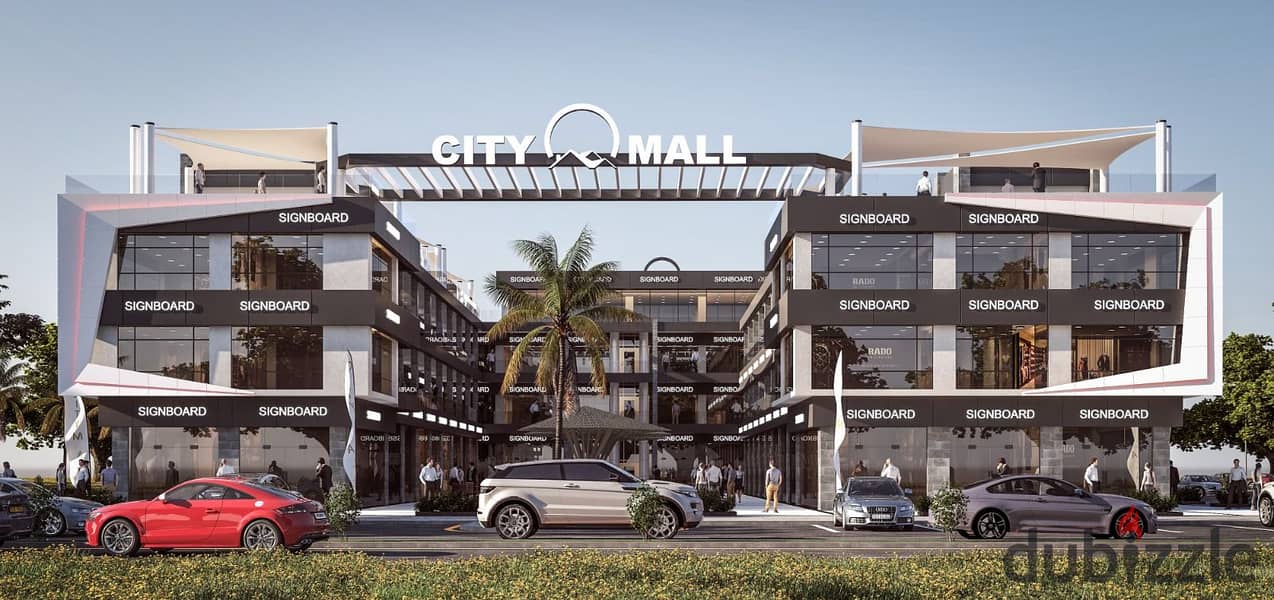 Shop for sale in October Gardens, Al-Khadamy Street, in the middle of the largest population density, area 43 square meters, down payment 301 thousand 0