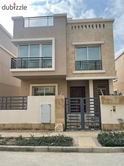 Villa for sale with garden, in installments, on a very special view, on the landscape, in front of Cairo Airport, in the Taj City compound.