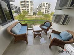 With the old price | Apartment with garden with 5% down payment in Taj City, in front of the airport, with a distinctive view. 0