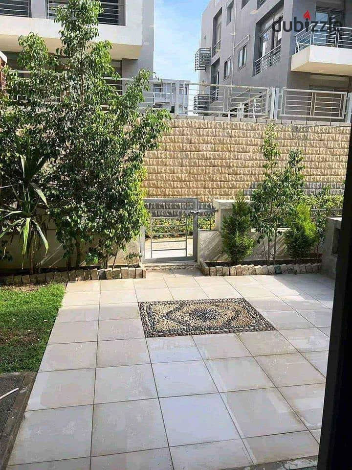 Apartment for sale in installments with cash discount on a very special view on Landscape in front of Cairo Airport in the Taj City Compound 8