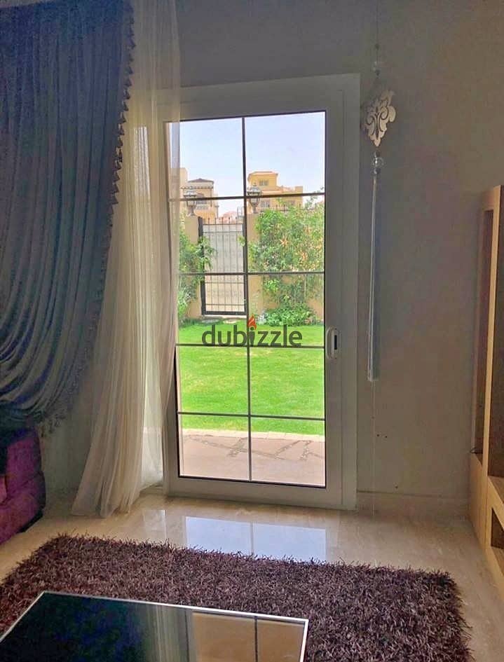 Apartment with garden for sale in installments on a very special view on the landscape in front of Cairo Airport in the Taj City compound 7